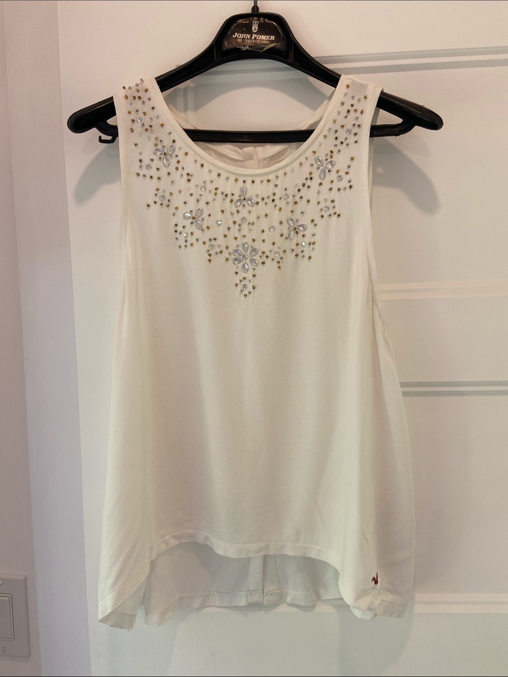Embellished White Sleeveless Top with Beaded Accents